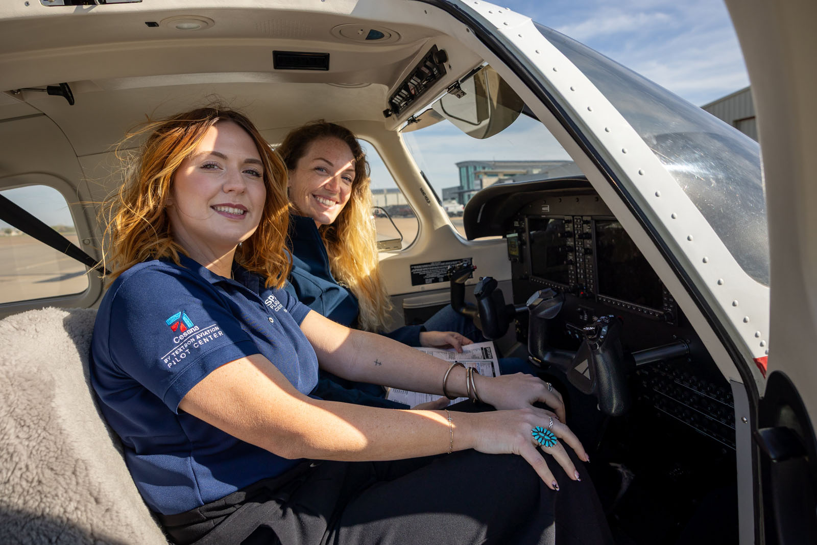 spartan flight academy cfi in plane with student