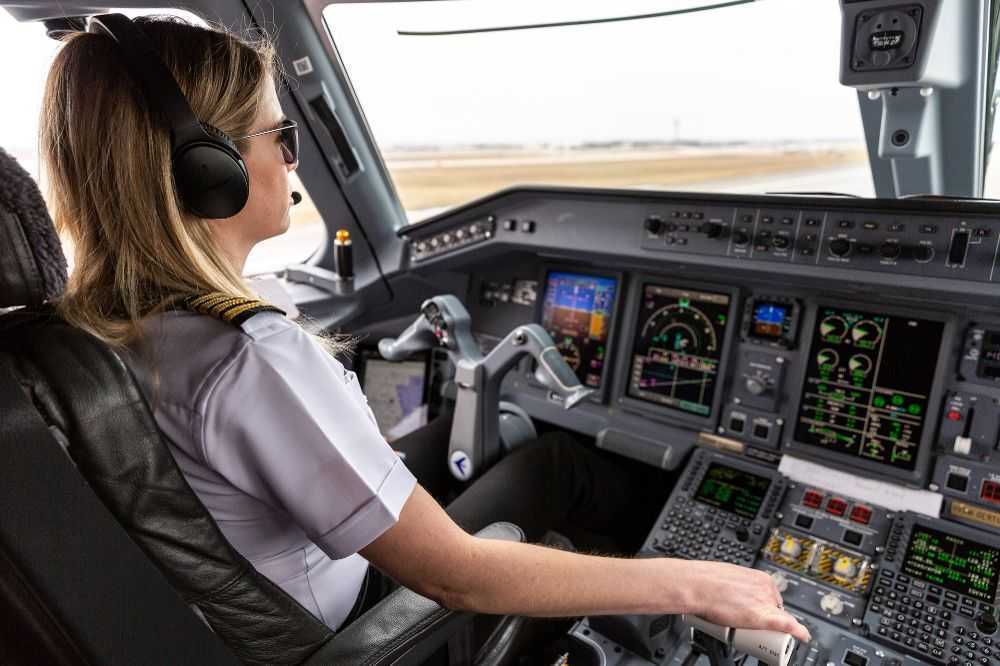 skywest-pilot in cockpit of plane